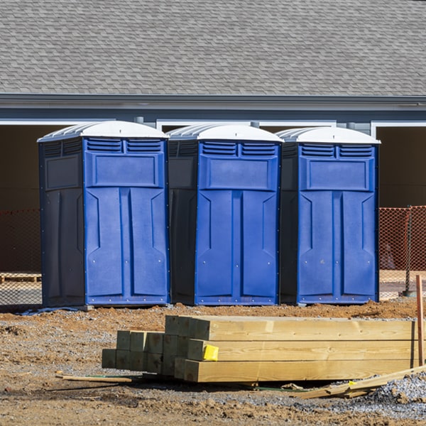 what is the cost difference between standard and deluxe portable toilet rentals in Germantown